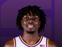 Mike Nwoko with the massive block at the rim