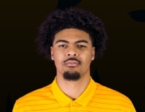 Michael Folarin elevates for slam vs. Hawai'i Rainbow Warriors