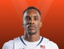 Ugonna Onyenso rises for a huge block for Virginia