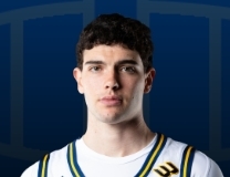 Harrison Carrington fights off defender for and-1