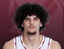 Lajae Jones fights off defender for and-1