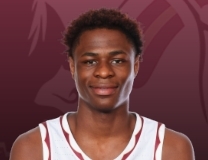 Thomas Bassong gets up for the beautiful slam