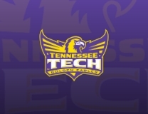 Ty Owens with the massive block at the rim