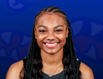 Knisha Godfrey finishes through contact