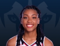 KK Arnold sinks a shot from the corner for UConn