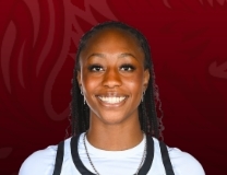 Joyce Edwards rises to block a triple