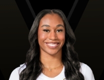 Mikayla Blakes with the hoop & harm