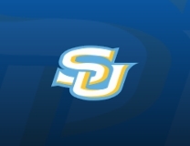 Jestiny Dixon knocks down basket