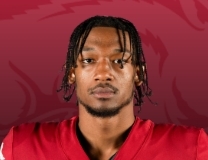 Arkansas’ Kani Walker takes an INT to the house