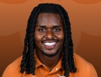 Texas' Arch Manning connects with CJ Baxter Jr. for a TD